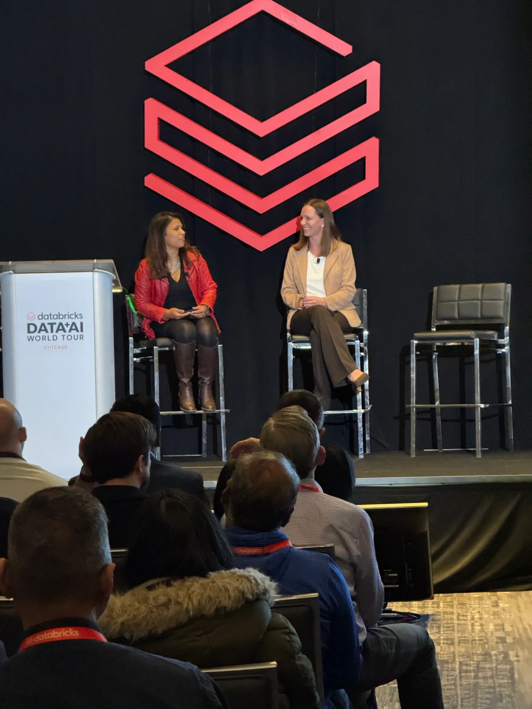 Emily on stage at the Databricks Financial Services Forum in Chicago